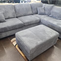 Gray Corduroy Sectional with storage ottoman