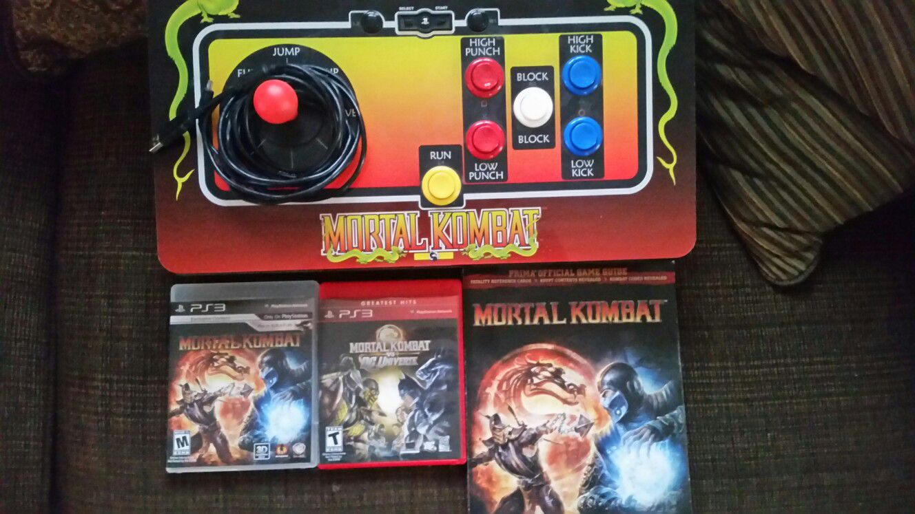 PS3 w kombat arcade joystick and comes with mortal kombat games mortal kombat vs DC and mortal kombat cheat codes book