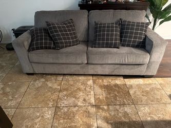 Grey cloth sofa rarely used