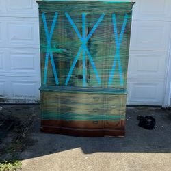 Beautiful antique hutch, brown with shelves glass doors three drawers need gone ASAP will not fit in new house wrapped and ready to go