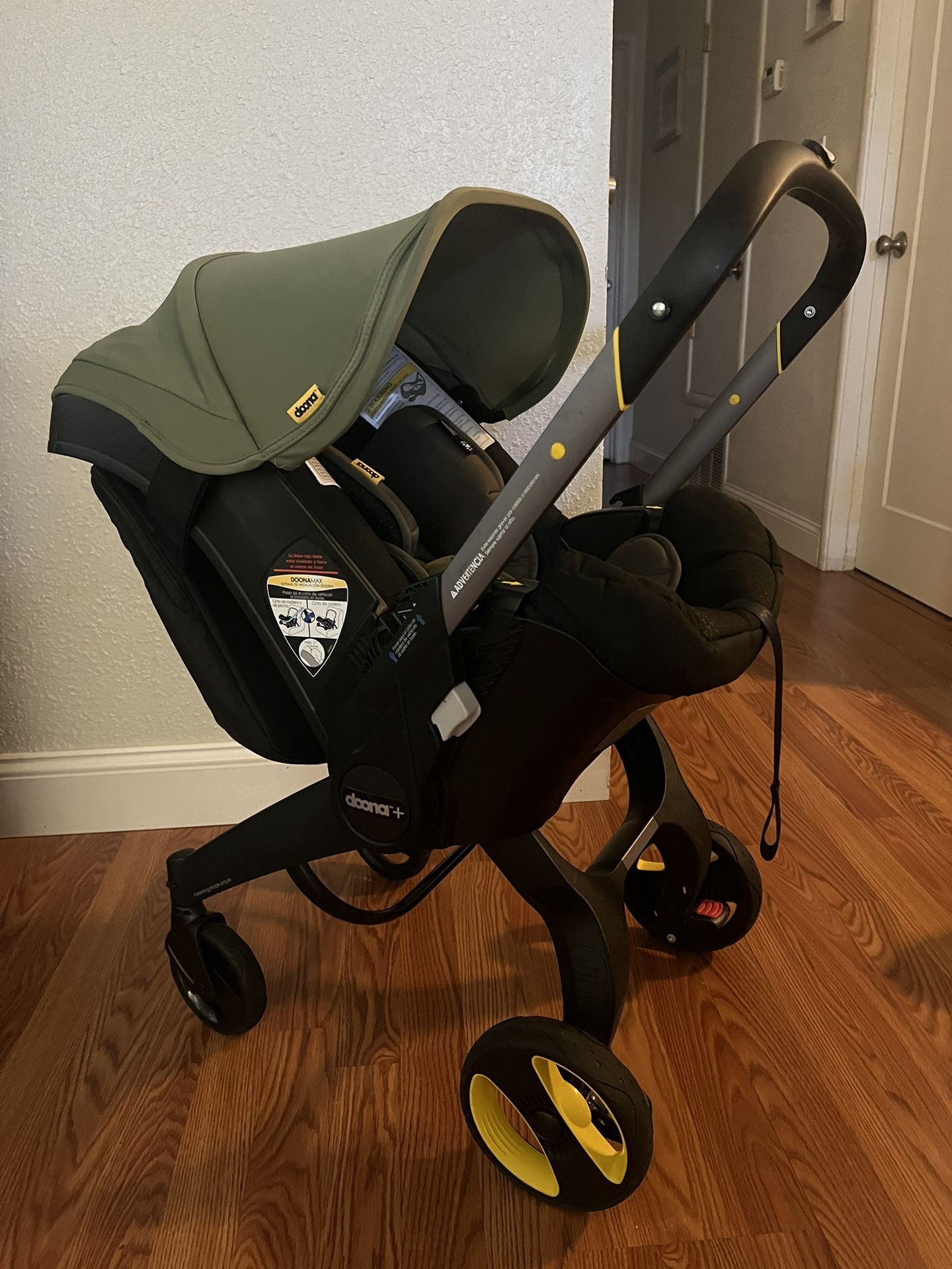 Desert Green Doona Stroller