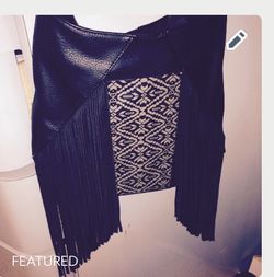 Leather Steve Madden pocketbook Black, black fringes on sides Excellent condition Authentic Bought last year used once !
