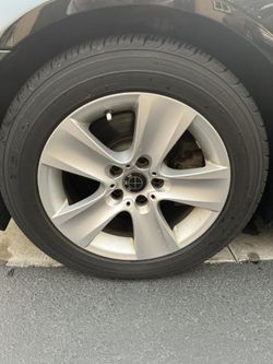 4 BMW RIMS AND TIRES