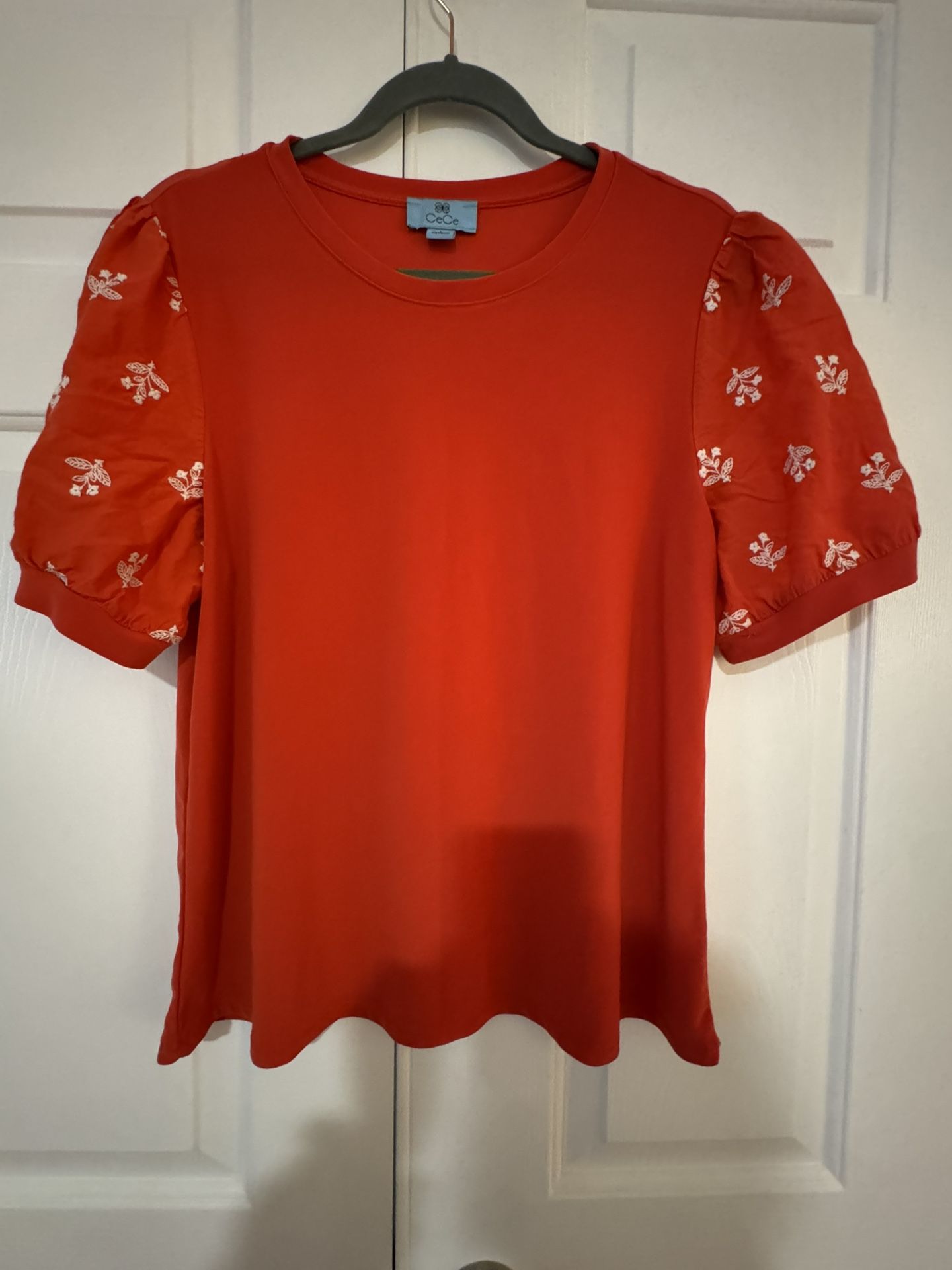 Nordstrom’s Cece Orange Top