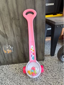 Fisher price corn popping push toy