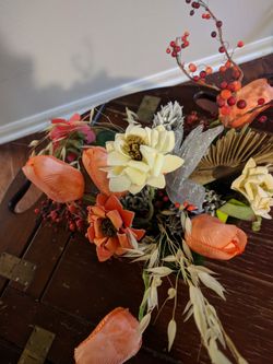 Flowers in a metal vase $13