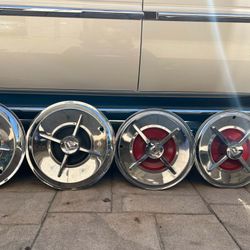FOUR 1957 DODGE LANCER HUBCAPS