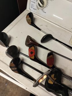 Golf Clubs Vintage And Tennis Rackets 