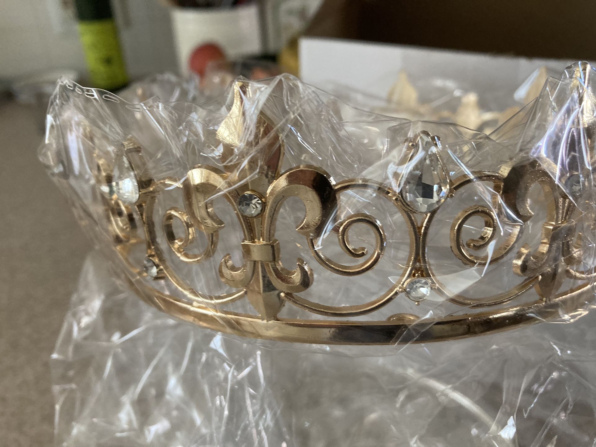Sweet 16 different crowns brand new in the box 8 of them