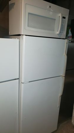 GEneral electric fridge side 30 by 67 microwave over the range..great condition warranty both item ,$400