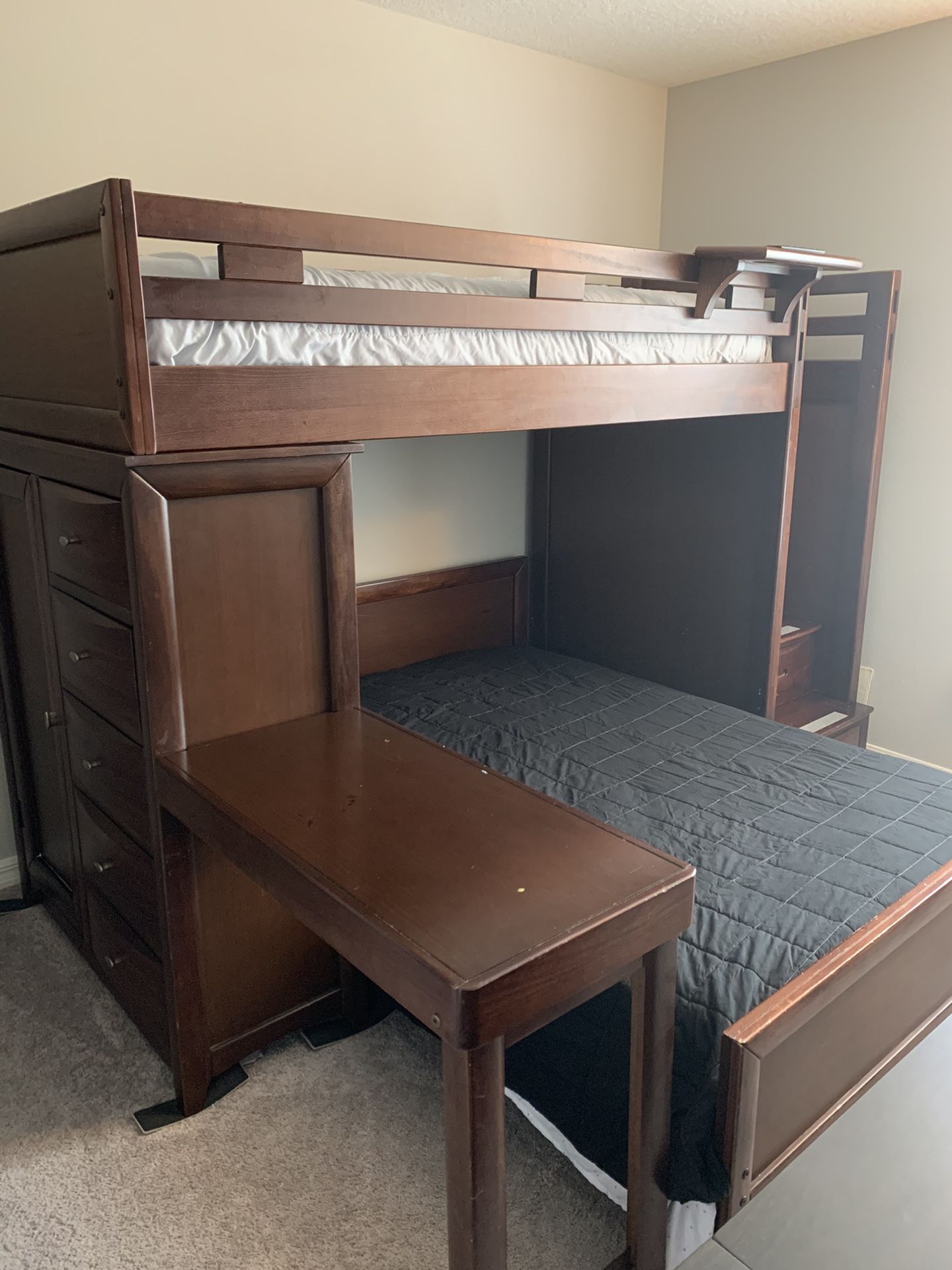 Bunk bed with desk and drawers. Mattresses included.