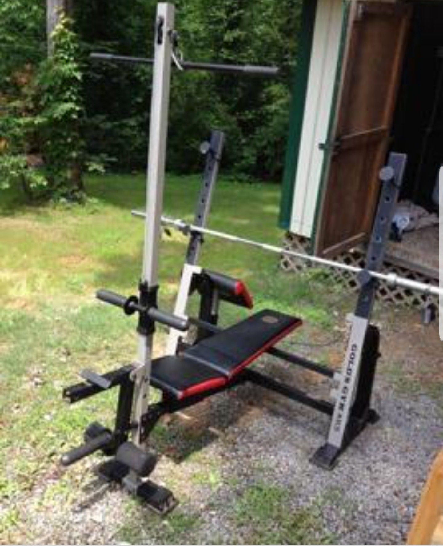 Gold gym bench comes with lat pull down bar, leg workout, arm curl pad. Excludes bench bar or weights