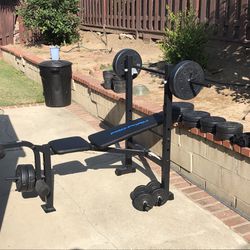 Pro Form weight bench and weight set