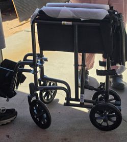 Transfer wheelchair that folds