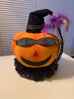 Masked pumpkin witch decoration