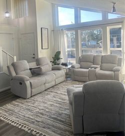 Costco gray chenille fully reclining three piece couch set