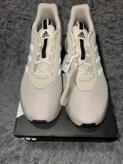 Size 9 men’s brand new unworn Adidas shoes with tags and box.