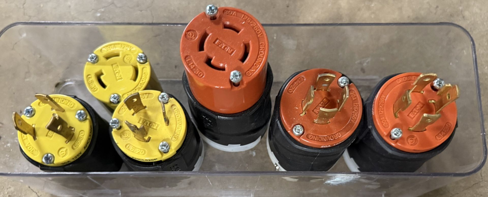 Several Eaton Arrow Hart Color Coded Industrial Locking Plugs