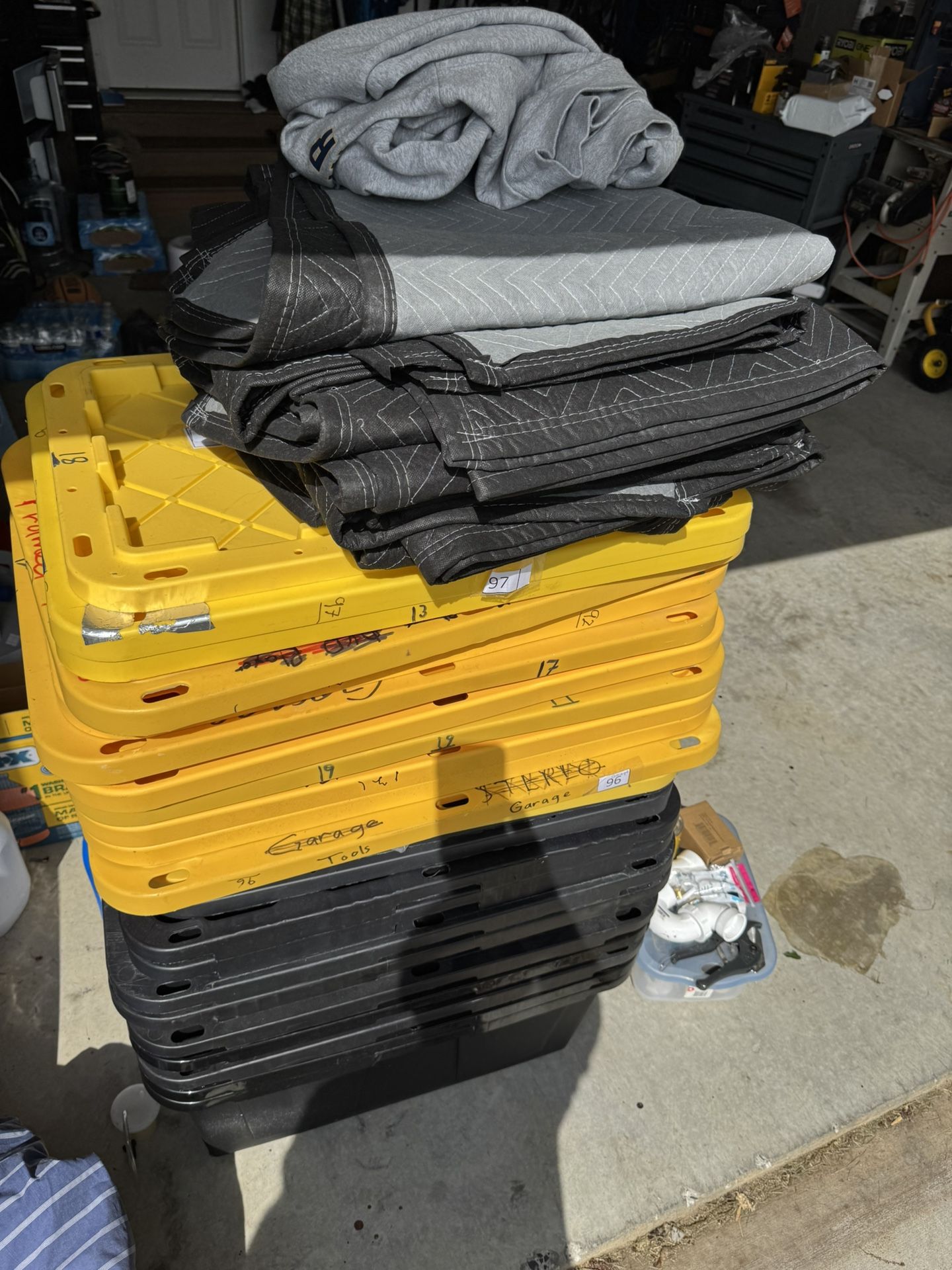 17 Large Bins With Tops And 20 Moving Blankets