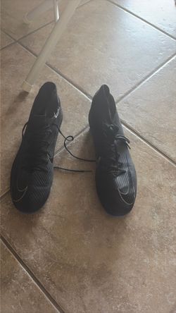 Blue and black cleats football