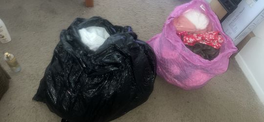 TWO BIG BAGS OF BABYGIRL CLOTHES