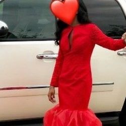 Size 6, red, Gorgeous Mermaid style prom dress with Sexy“peep hole slit in breast area.” Slimming and figure flattering!