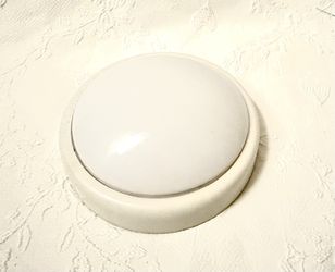 Battery operated push light