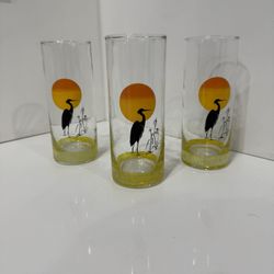 Set of 3 vintage Panache tall tumblers featuring a silhouetted heron or crane with sunset 