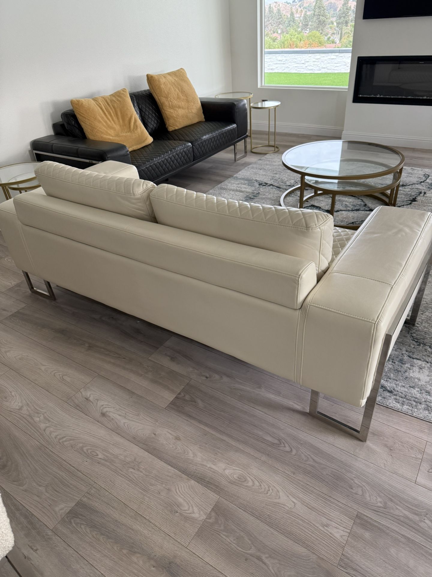 Set Of Three Sofas Two Black, One White 