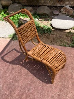 Vintage mini rattan doll chair