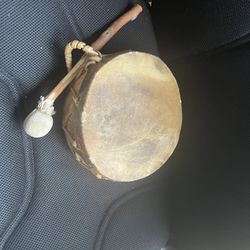 Authentic animal skin drum and stick