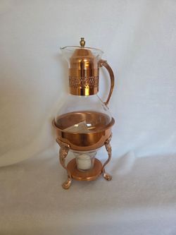 446, I identified it as a vintage copper coffee pot by Princess House