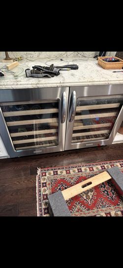 One Kitchen Aid wine cooler