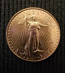 1999 American Golden /  Gold Eagle coin, 17 grams
of 22k solid gold, uncirculated proof