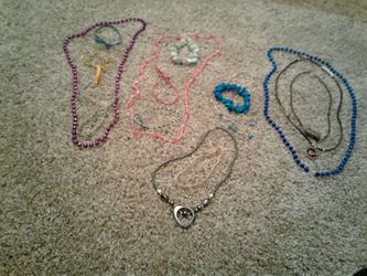 8 bracelets and 7 necklaces