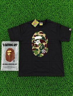 Black BAPE shirt with Green ABC Camo Milo  on the front.
