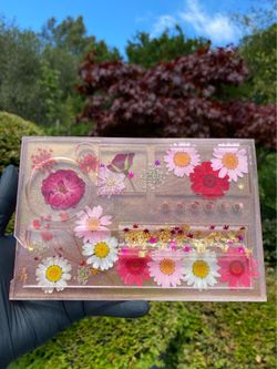 Pink resin tray with pressed flowers