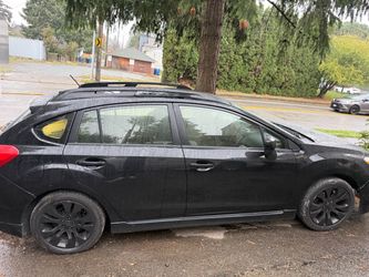 Black Subaru Impreza Hatchback