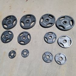 Lots Of Olympic Weights Available. 45s, 35s, 25s, 10s, 5s. $1 a pound  Very nice dumbbells A Couple Of  40 Lbs And 7 Ft Olympic Bars