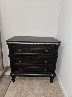 Dark Wood Nightstand With Metal Accents