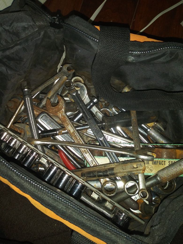 Box of assorted tools (ratchets and wrenches)