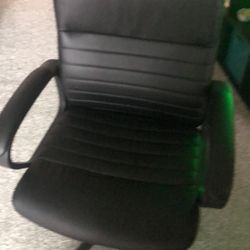 Newer Black Leather Swivel Office Chair