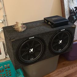 2 Kicker 12’s With A Box Amp And Some Wiring 