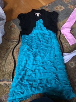 Lots of girl clothes, Justice, Levi’s, and dresses