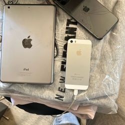 Apple Phones And One Tablet 