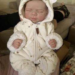 Vinyl reborn baby doll