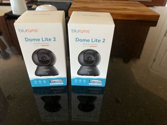 Bluram security cameras. Two black one white.