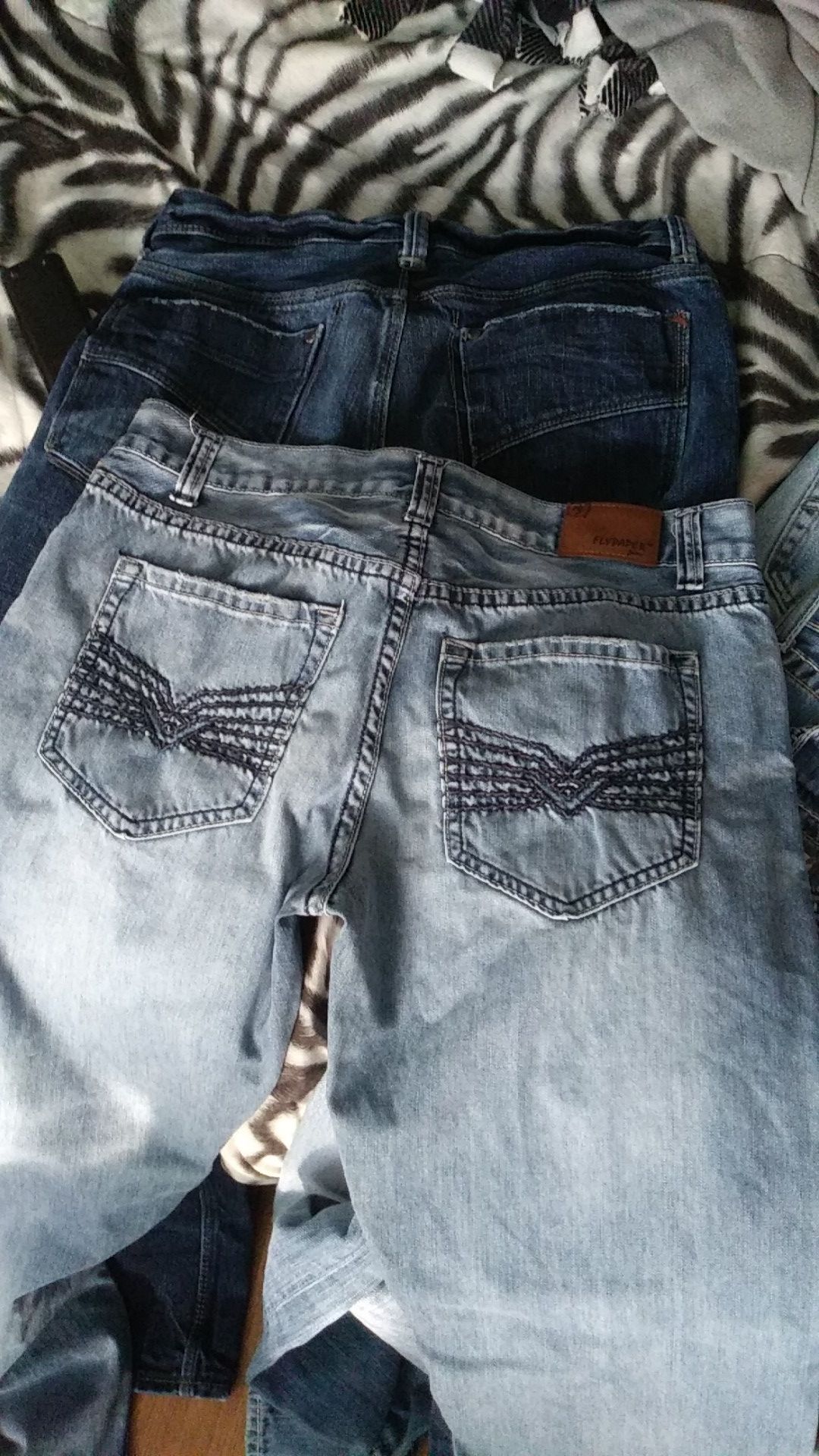 Ive got 6 pair of jeans..american eagle..flypaper..true luck..bigstar..levie....and a brand new pair of suede jordan tennis shoes!!!!