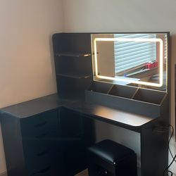 Black L shaped vanity desk with lighted mirror & stool