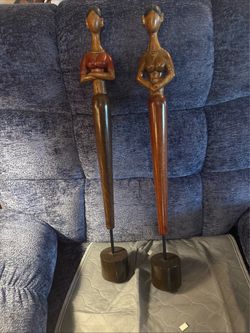 Pair of Tall Carved Wood Female Figurines